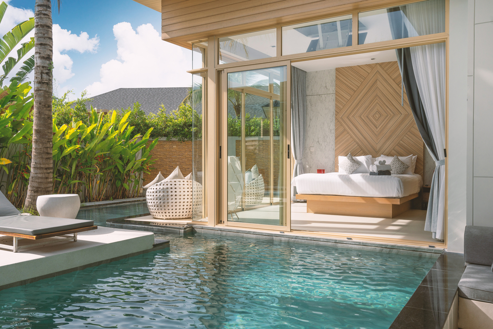Interior and exterior design in bedroom of luxury pool villa, ho
